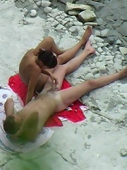 Nude tanned babe fondled and fucked at the seaside